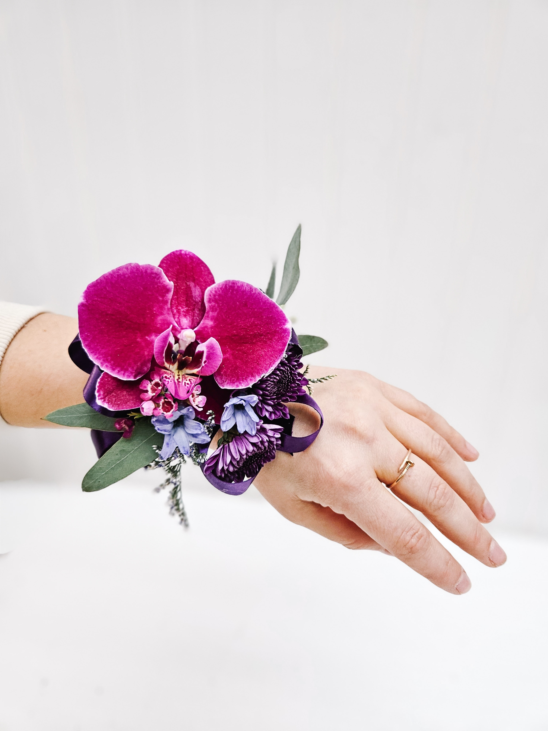 Pink and purple toned corsage for prom.