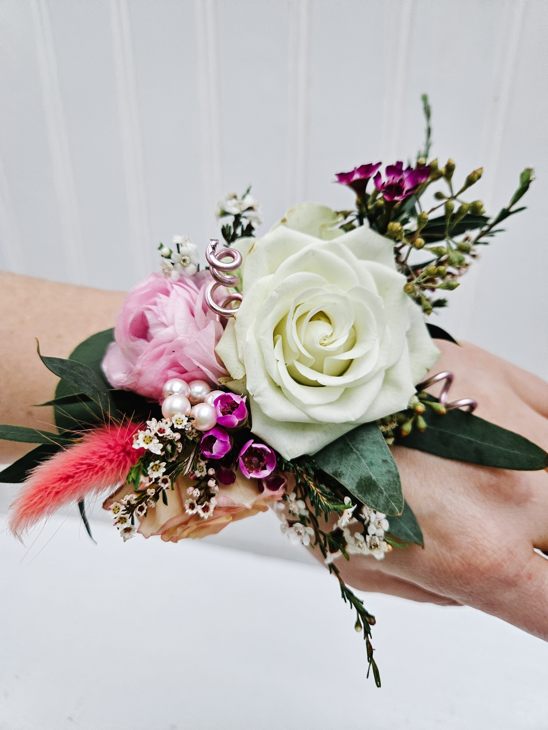 Pink and white toned corsage
